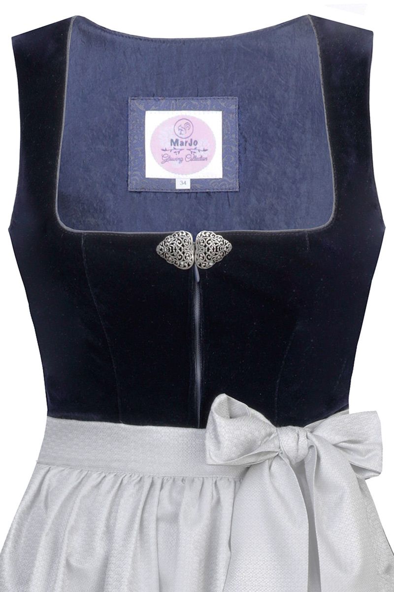 Elegantes Dirndl-Oberteil in Dunkelblau mit silberner Brosche und passender Schürze.