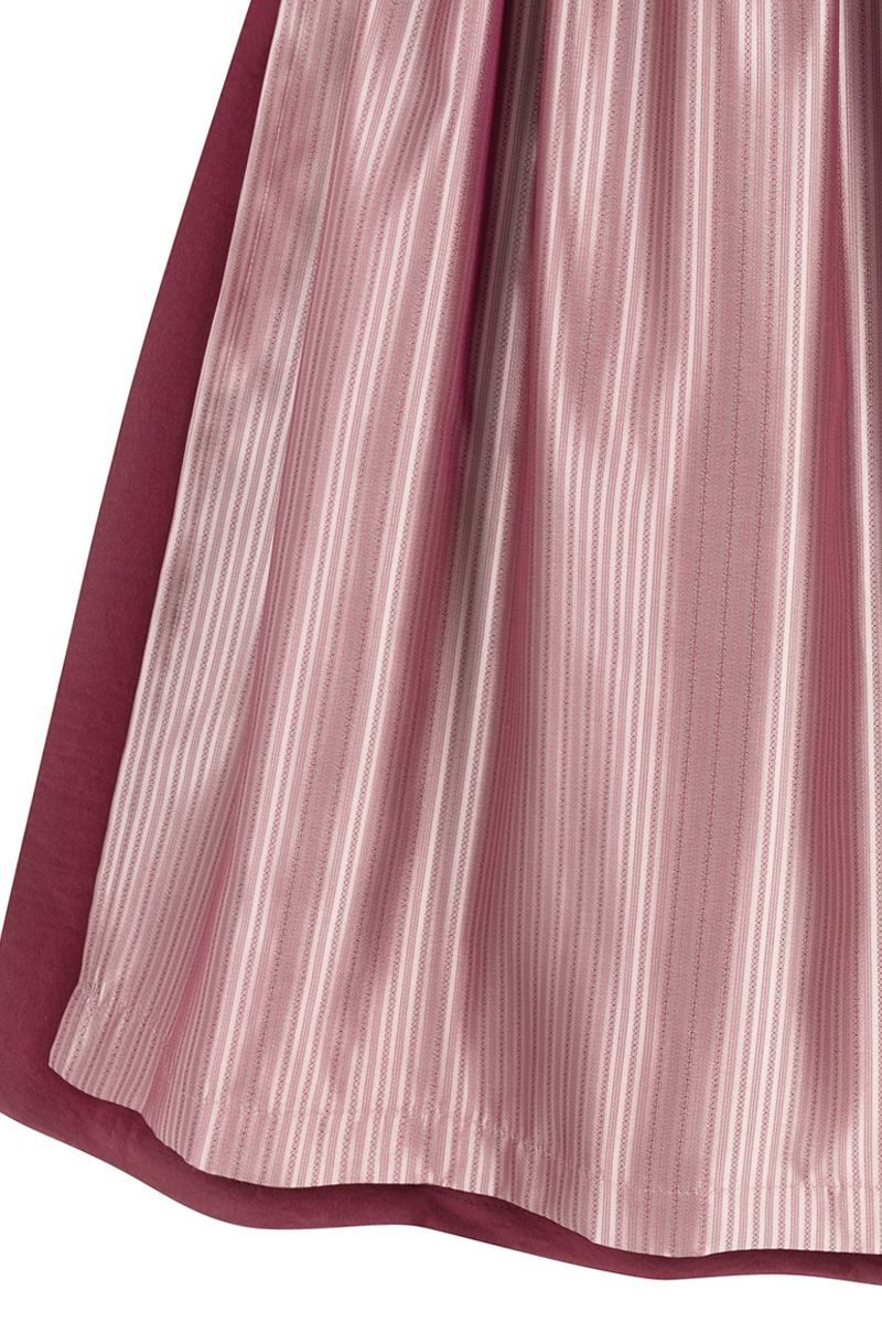 Eleganter rosa Dirndlrock von MOSER Trachten mit feinen Streifen.