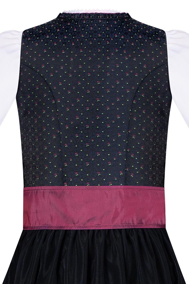 Elegantes Trachtenkleid mit floralem Muster und lila Zierschürze von MOSER Trachten.
