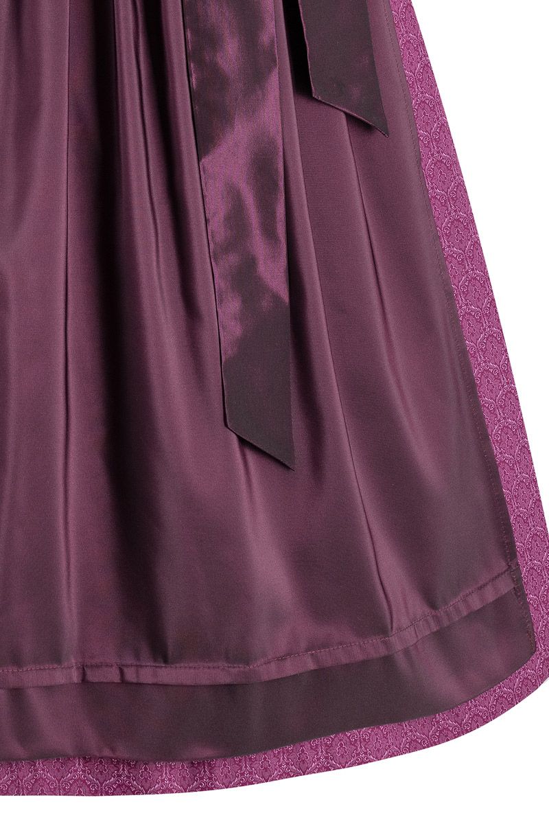 Elegantes Dirndl in Brombeere von MOSER Trachten mit feiner Schürze.