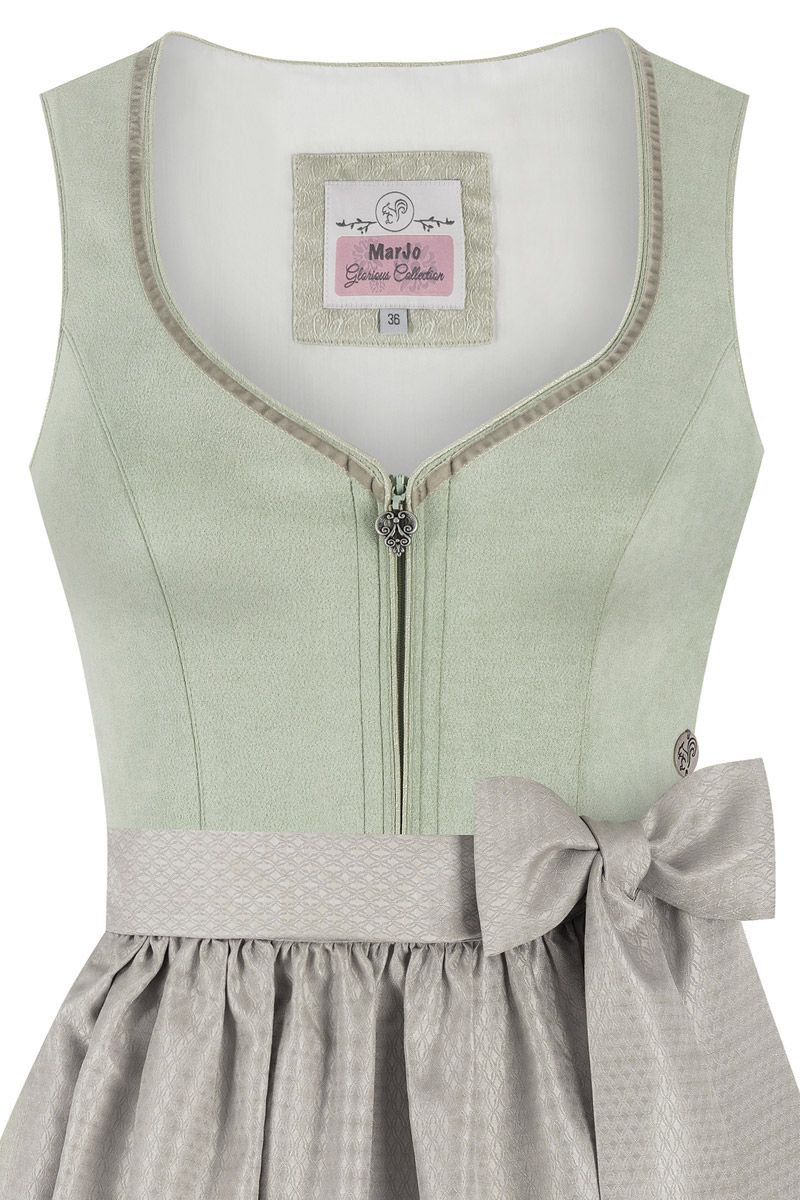 Grünes Moser Dirndl mit traditionellem Design und elegantem Muster.