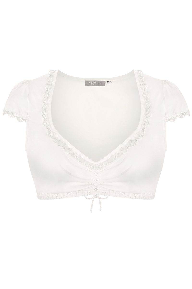 Weiße Moser Dirndlbluse mit Spitze und Schnürung ergänzt traditionelle Trachtenmode.
