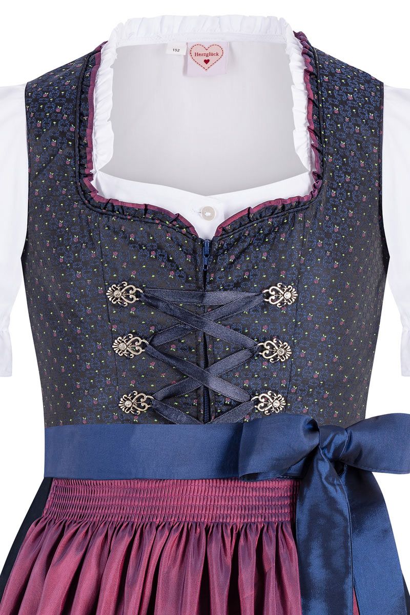 Elegantes Dirndl mit blauem Mieder und pinkfarbener Schürze von MOSER Trachten.