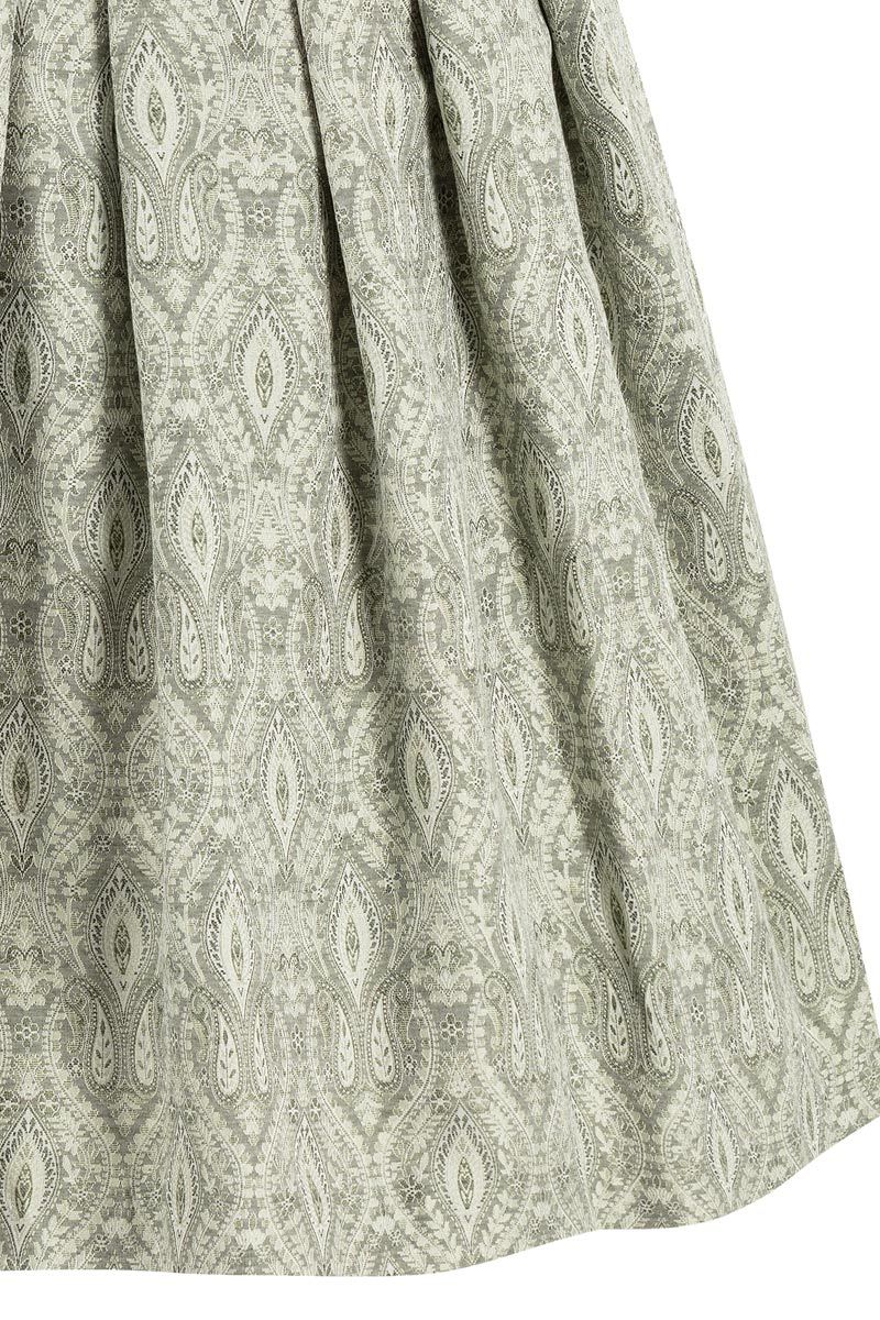 Graues Dirndlstoffmuster mit traditionellem, detailreichem Paisley-Design von MOSER Trachten.