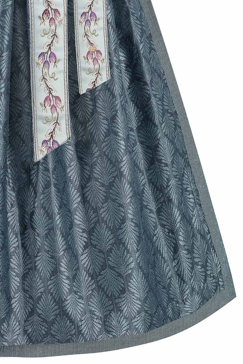 Eleganter Jacquard-Dirndlrock in dunklem Blau mit floralen Stickereien von MOSER Trachten.