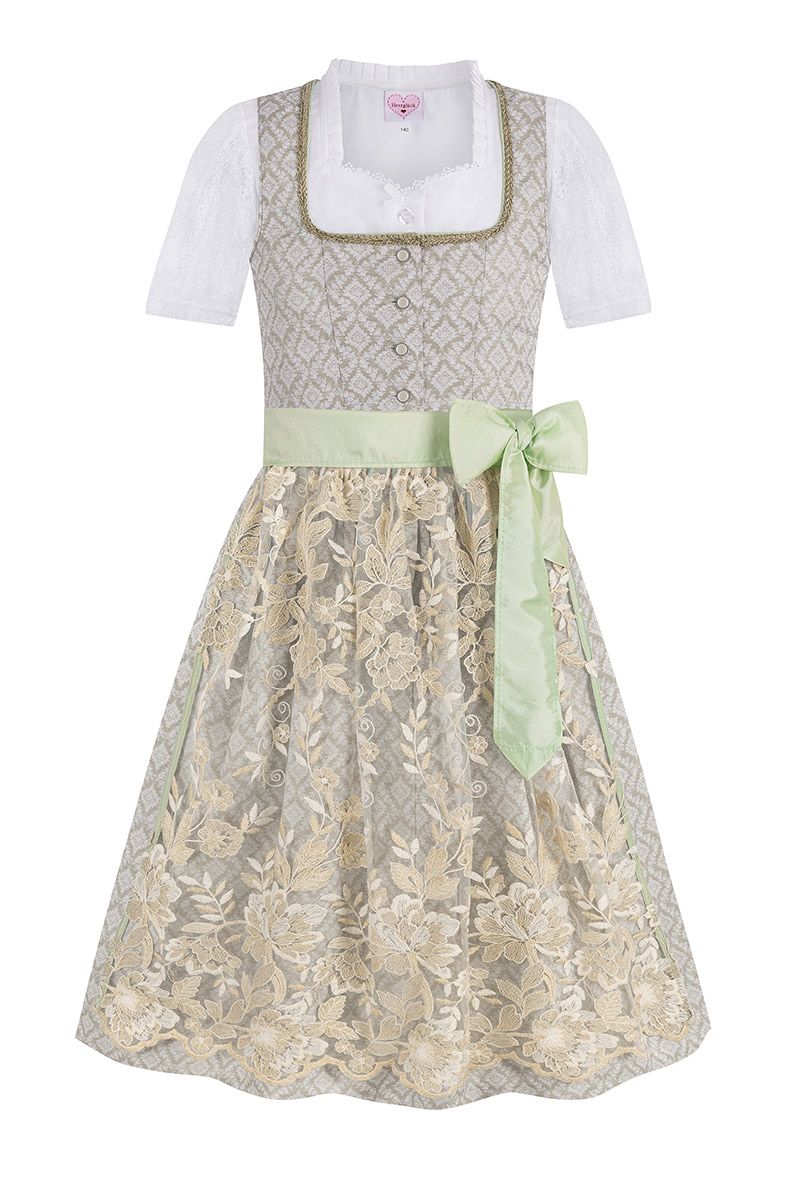 Elegantes Dirndl von MOSER Trachten mit goldener Spitze und grünem Band.