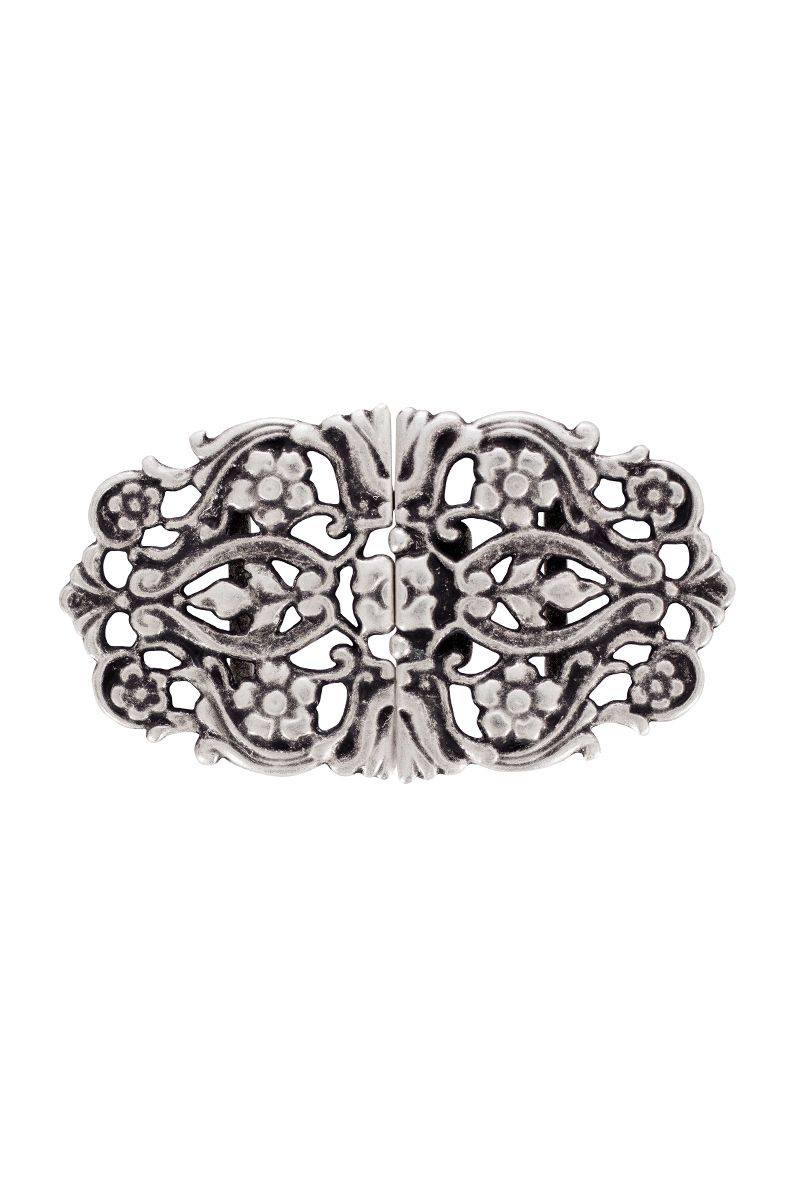 Filigrane Dirndlschließe mit Blumenmotiv aus Metall, passend für MOSER Trachtenmode.