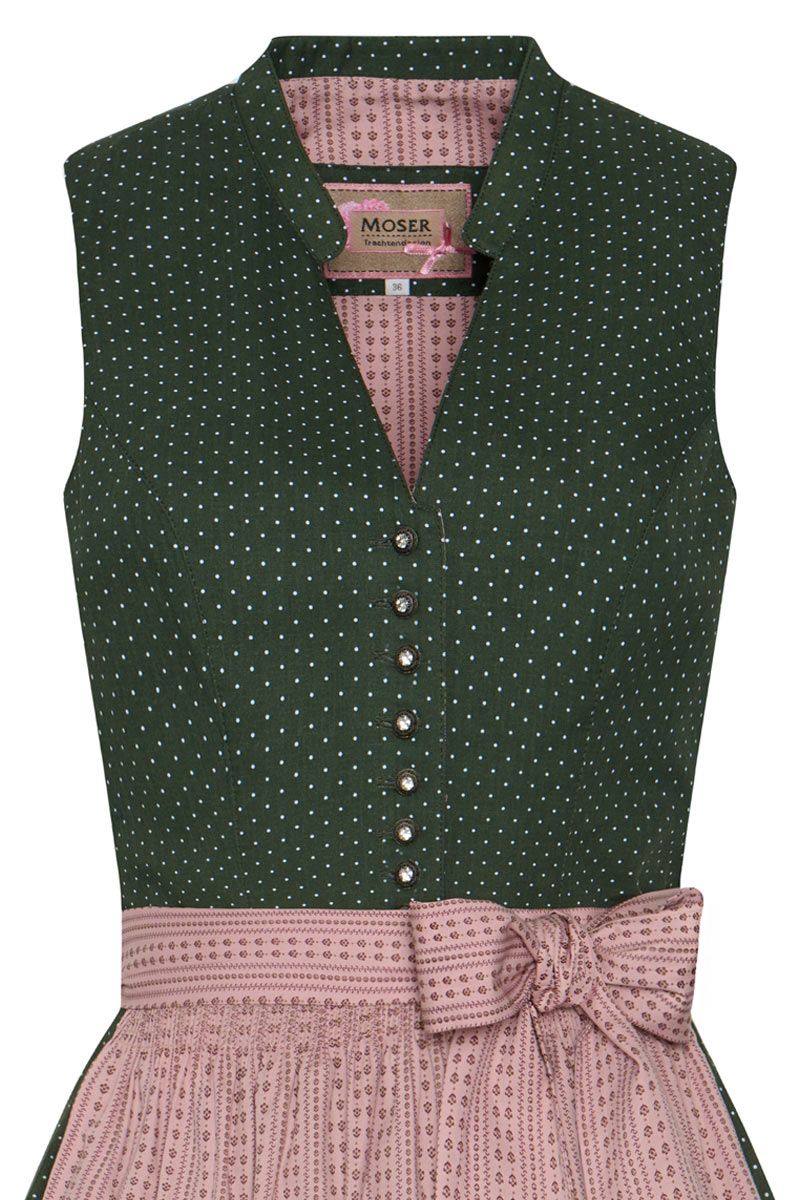 Grüner MOSER Trachten-Dirndl mit weißen Punkten und rosa Schürze aus Baumwolle.
