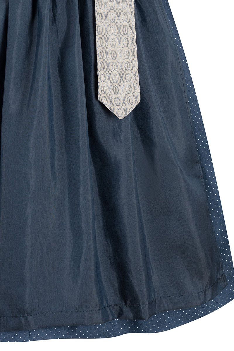 Eleganter blauer Dirndl-Rock mit gepunktetem Saum und hell gemustertem Schürzenband.